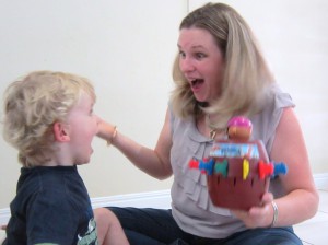 speech pathologist and child surprised